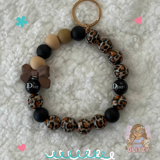 Leopard Luxe Dior-Inspired Wristlet – with Clay Bow Charm